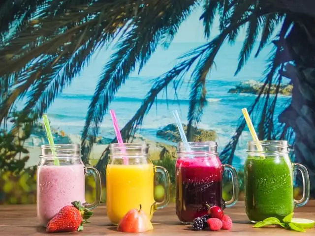 Different types of smoothies in glasses